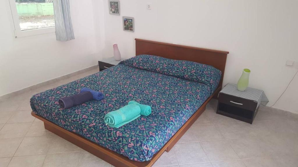 Postel nebo postele na pokoji v ubytování PortoAgali