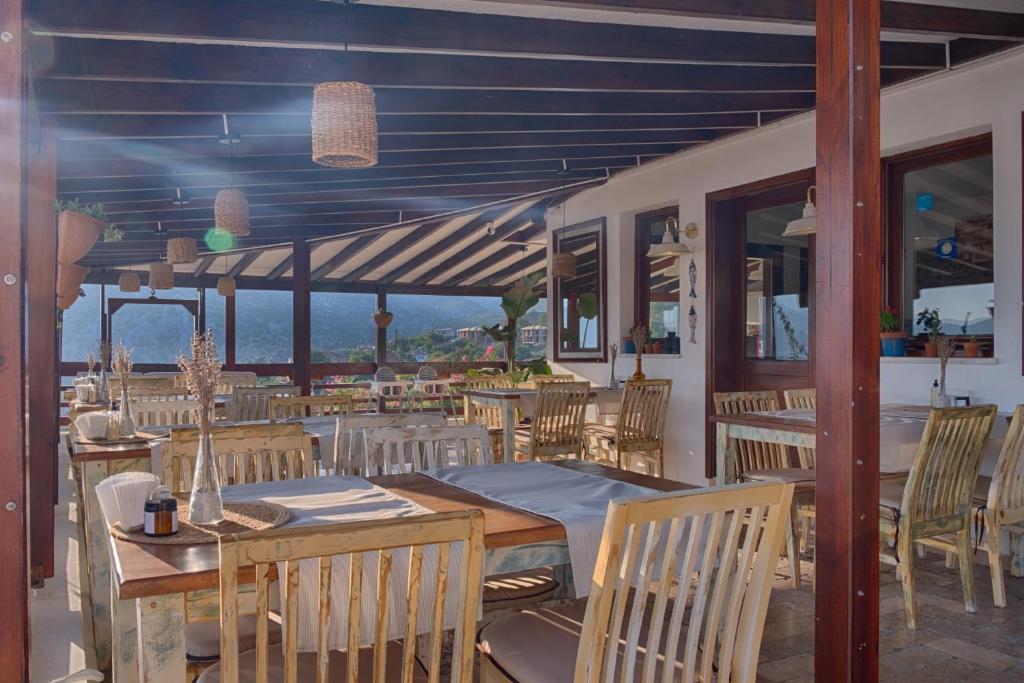 Restaurace v ubytování Les Terrasses De Selimiye