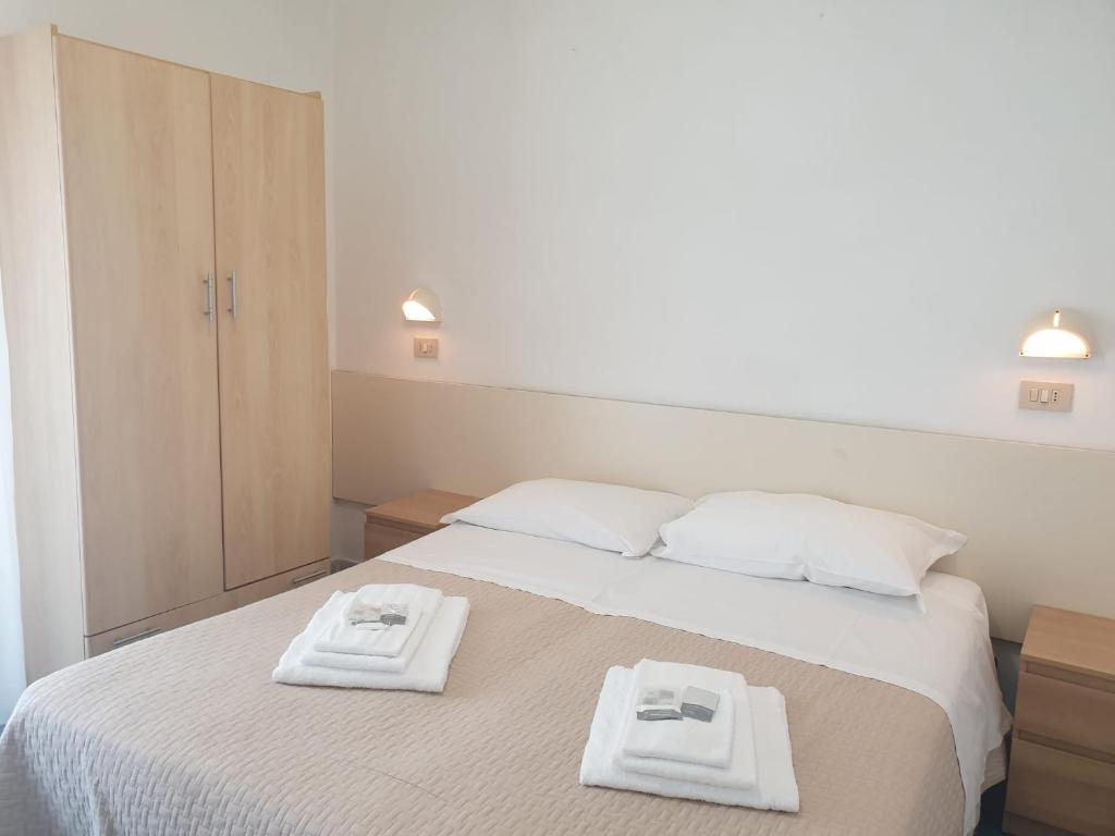 Postel nebo postele na pokoji v ubytování Hotel Baden Baden