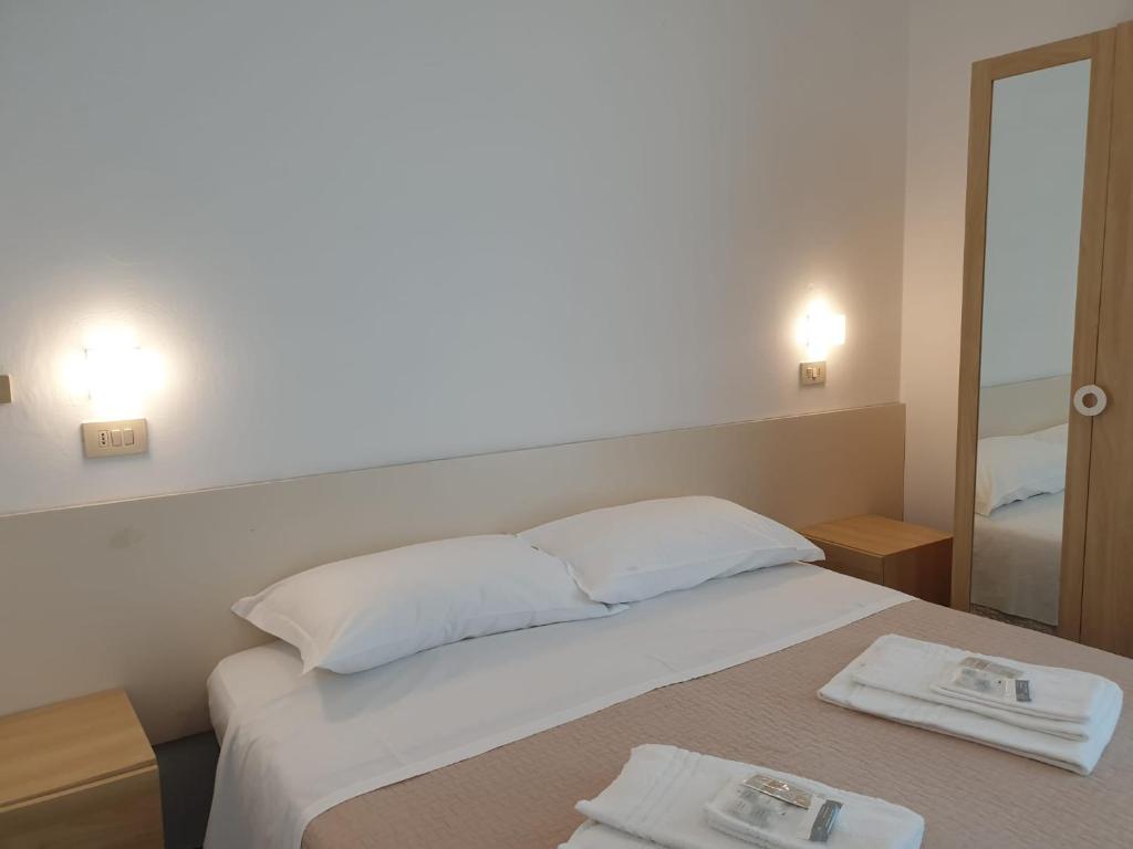 Postel nebo postele na pokoji v ubytování Hotel Baden Baden