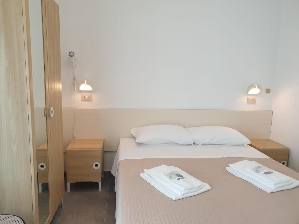 Postel nebo postele na pokoji v ubytování Hotel Baden Baden