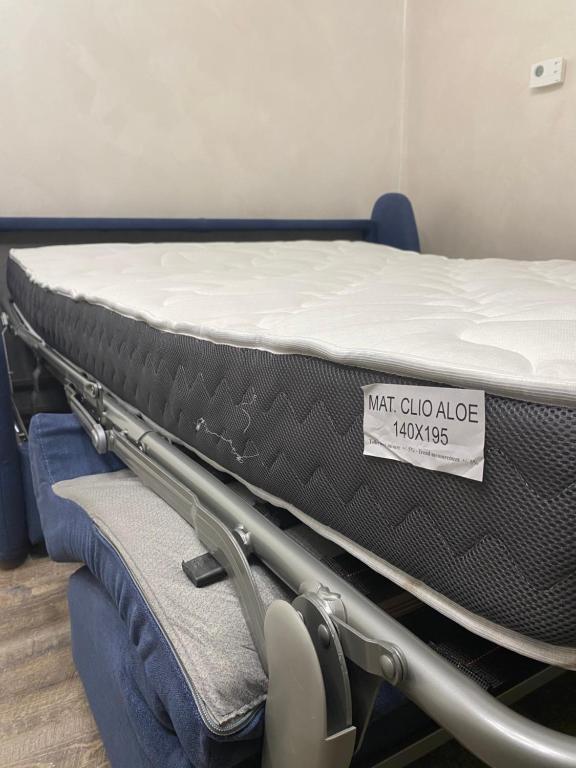 Łóżko lub łóżka w pokoju w obiekcie Home Chiara