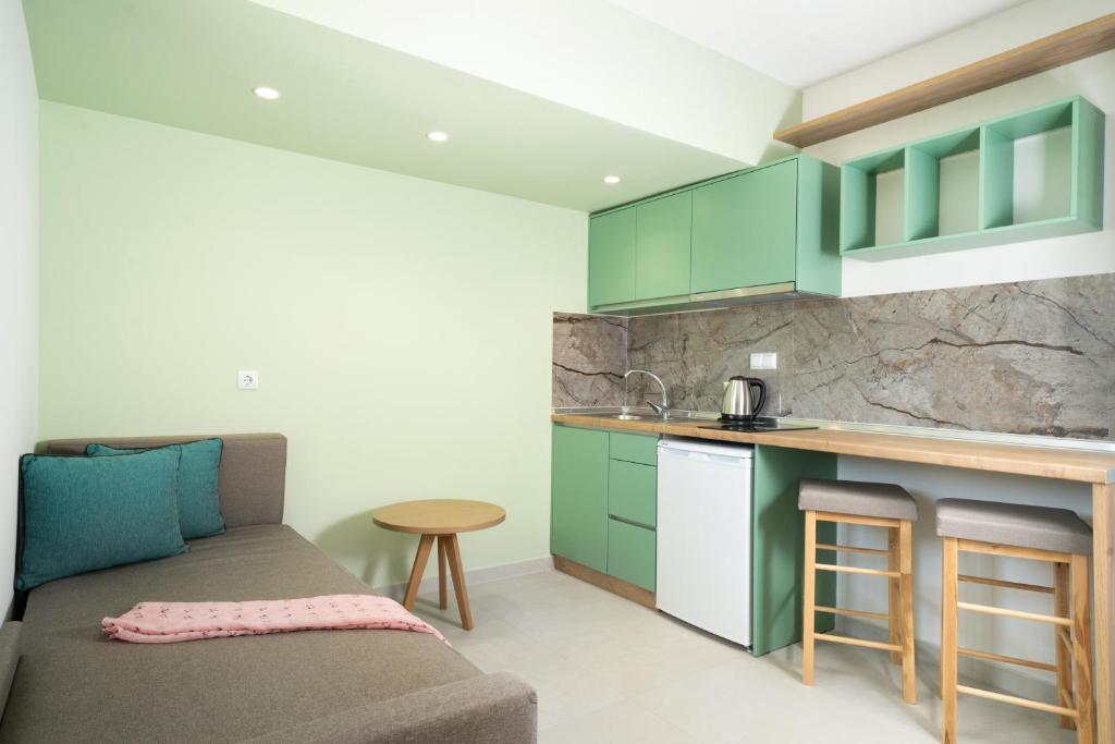 Kuchyň nebo kuchyňský kout v ubytování Miracle Suites by Klisma beach