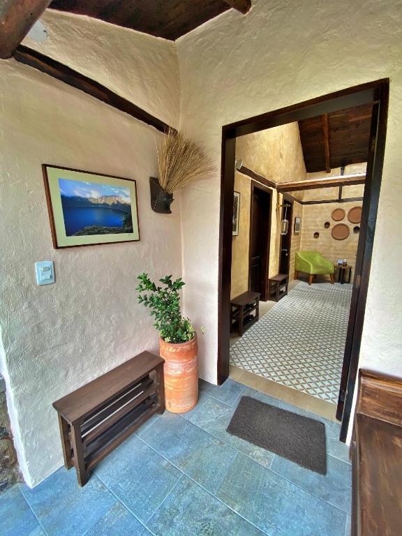 Postel nebo postele na pokoji v ubytování Chilcabamba Lodge