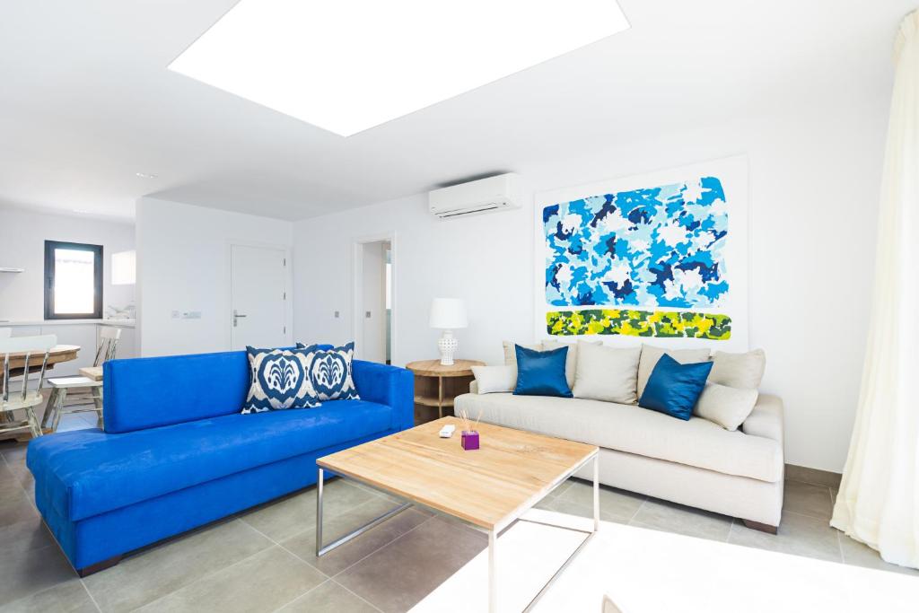 Posezení v ubytování Altos de la Gloria Beach Apartments