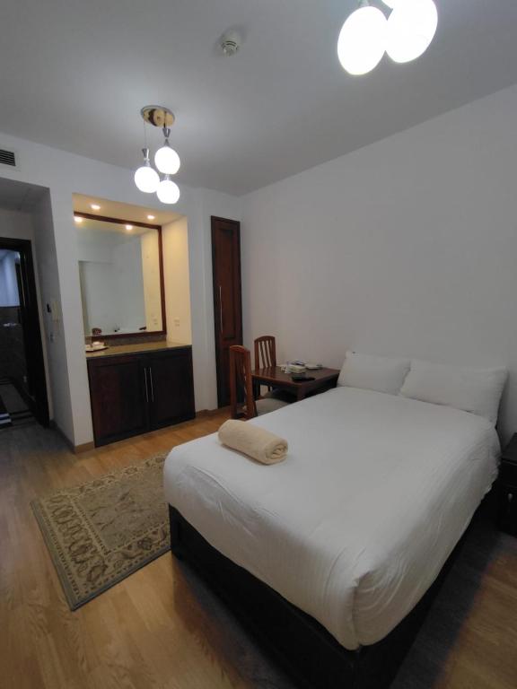 Postel nebo postele na pokoji v ubytování E-Just Hotel Borg El Arab