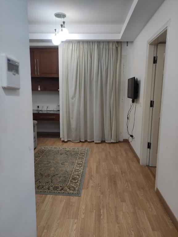 TV a/nebo společenská místnost v ubytování E-Just Hotel Borg El Arab