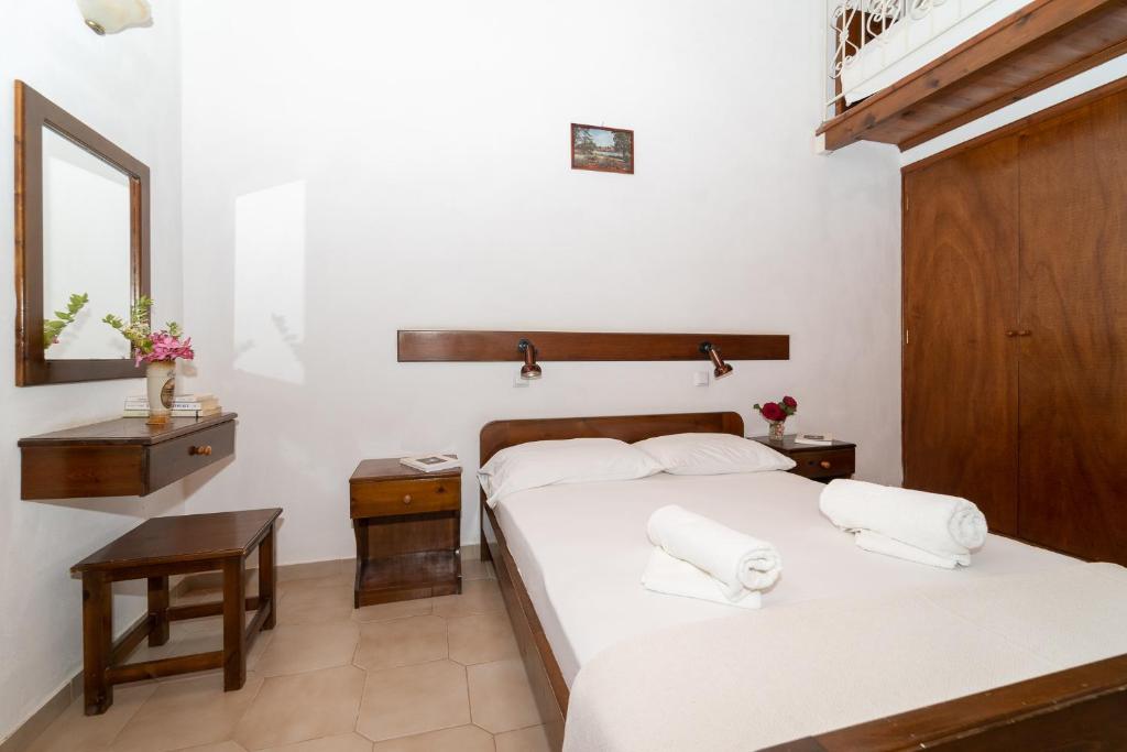 Postel nebo postele na pokoji v ubytování Ilias Apartments