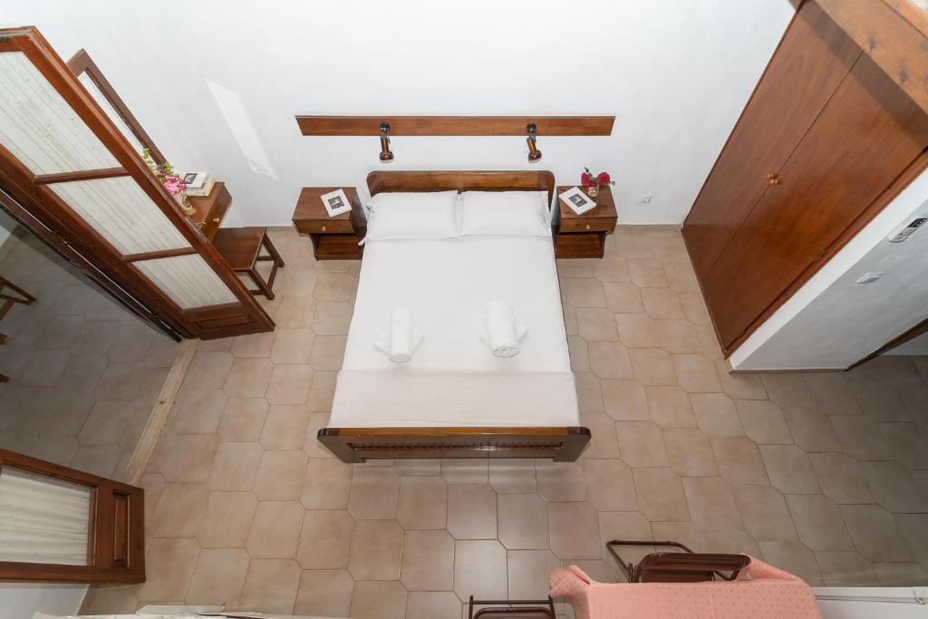 Postel nebo postele na pokoji v ubytování Ilias Apartments