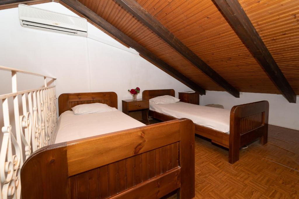 Postel nebo postele na pokoji v ubytování Ilias Apartments