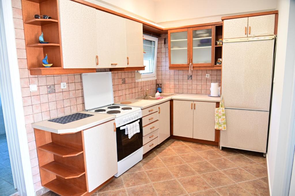 Kuchyň nebo kuchyňský kout v ubytování Happinies apartments 2