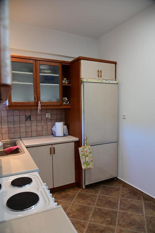 Kuchyň nebo kuchyňský kout v ubytování Happinies apartments 2