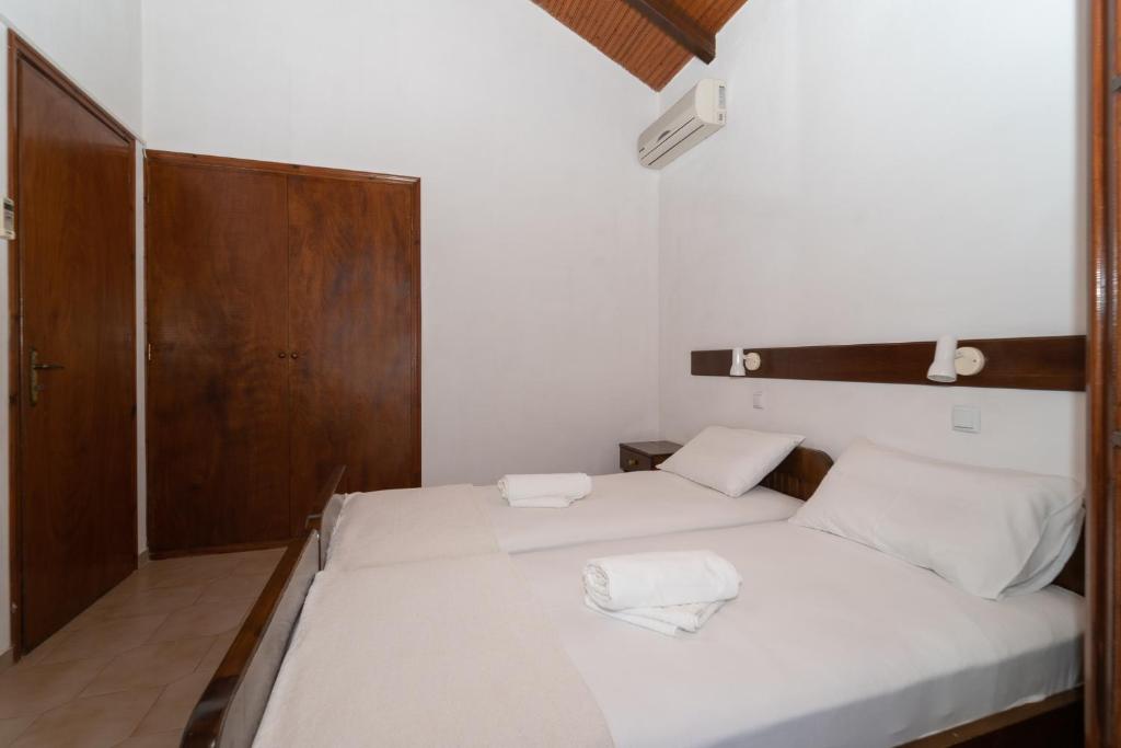 Postel nebo postele na pokoji v ubytování Ilias Apartments