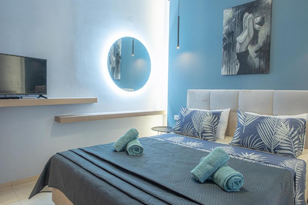 Posteľ alebo postele v izbe v ubytovaní Smaragda Apartment