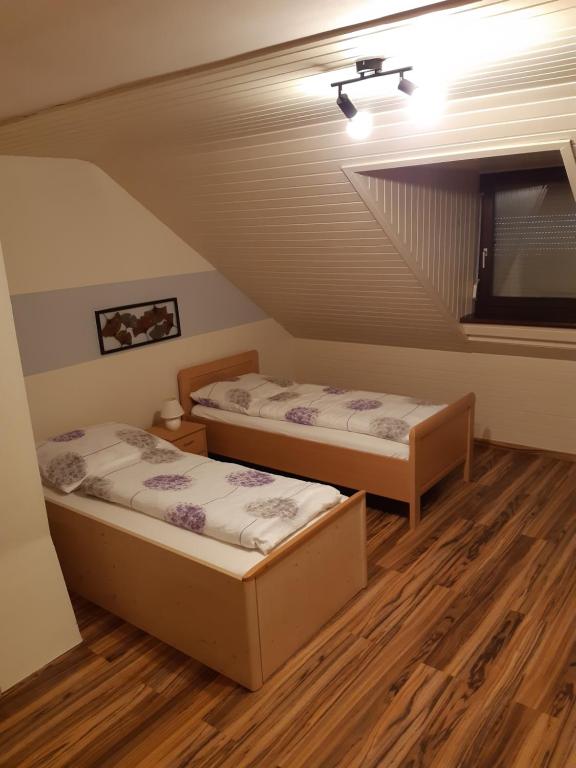 Postel nebo postele na pokoji v ubytování Appartement Ferienwohnung LANG