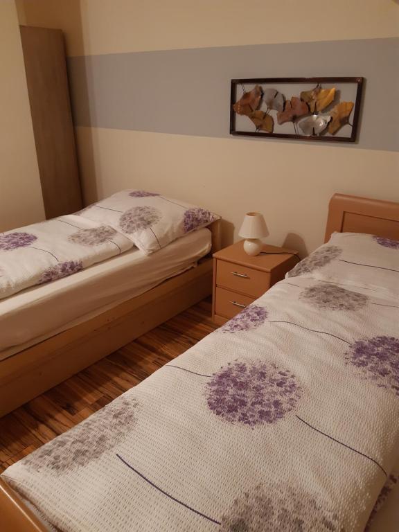 Postel nebo postele na pokoji v ubytování Appartement Ferienwohnung LANG