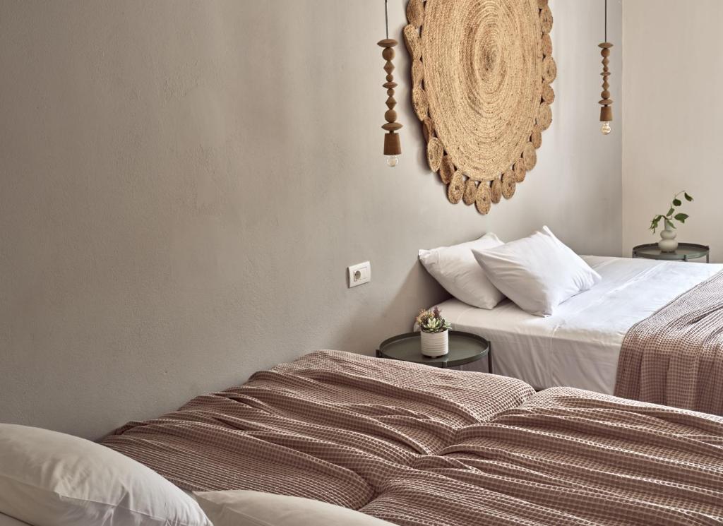 A bed or beds in a room at Casa Del Mar