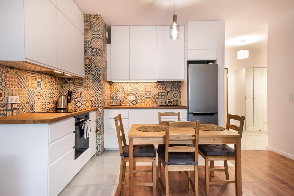 Kuchyňa alebo kuchynka v ubytovaní Saska Kępa Bright Apartament