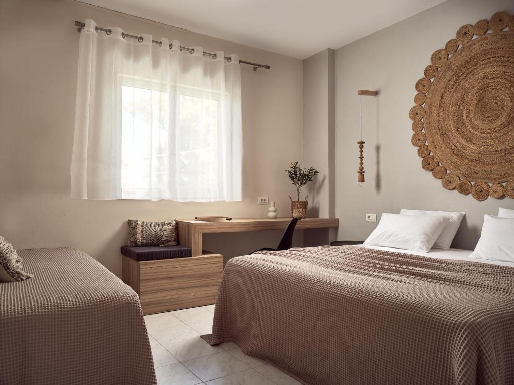 A bed or beds in a room at Casa Del Mar