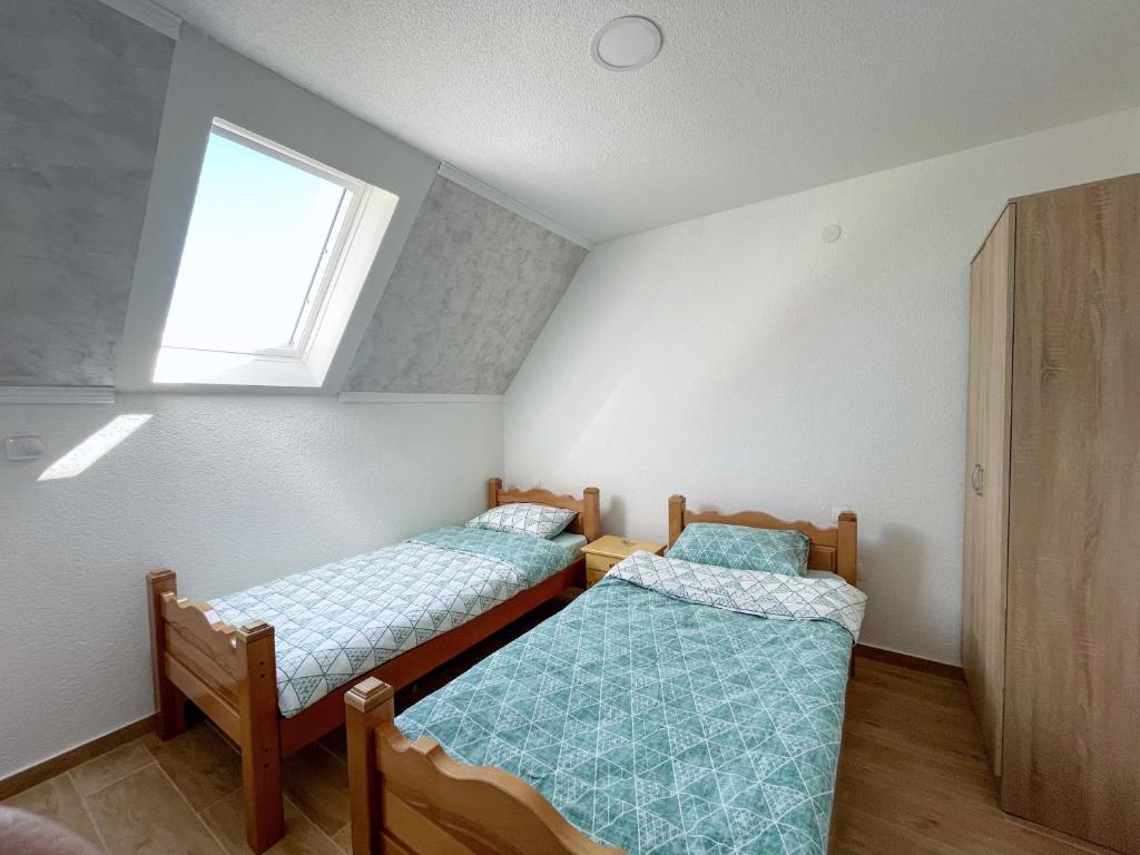 Postel nebo postele na pokoji v ubytování Gorštak
