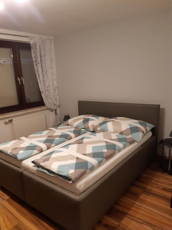 Postel nebo postele na pokoji v ubytování Appartement Ferienwohnung LANG