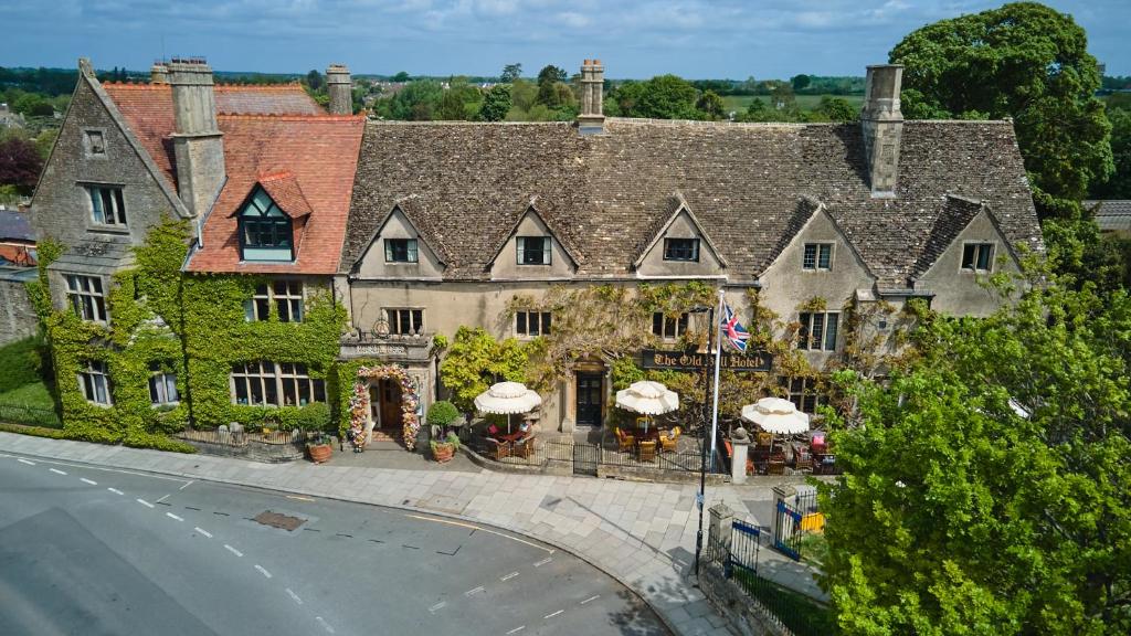 an aerial view of a large house with a street at Old Bell Hotel in Malmesbury