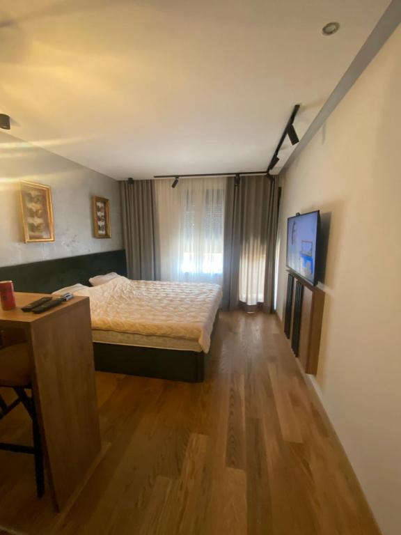 Postel nebo postele na pokoji v ubytování Gomax apartman 4