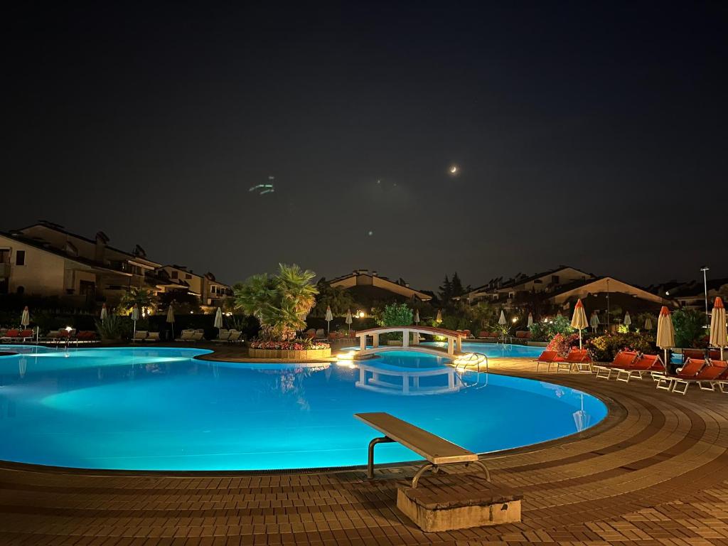 Bazén v ubytovaní Green Apartment and Pools alebo v jeho blízkosti