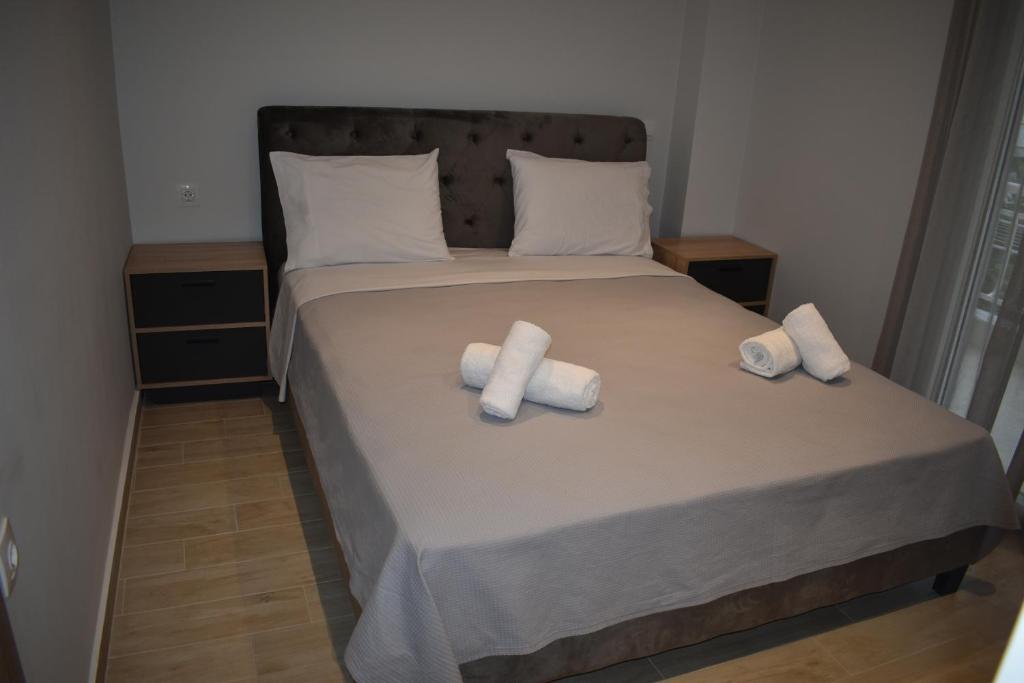 Postel nebo postele na pokoji v ubytování Sea view luxury apartment in Nea Kallikratia.