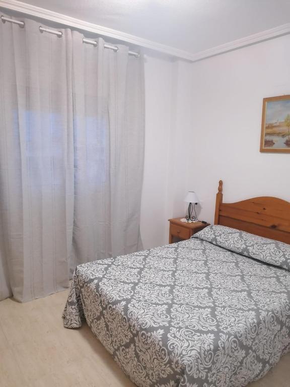 Posteľ alebo postele v izbe v ubytovaní Schöne Ferienwohnung in Playa del Cura