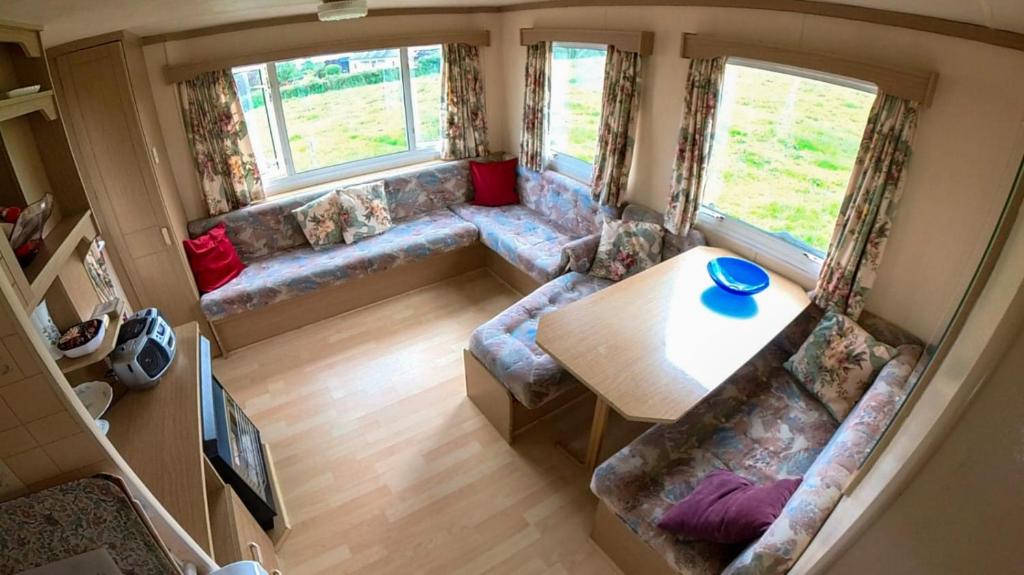 an overhead view of a living room in a caravan at DEVIL'S BIT accommodation in Killea