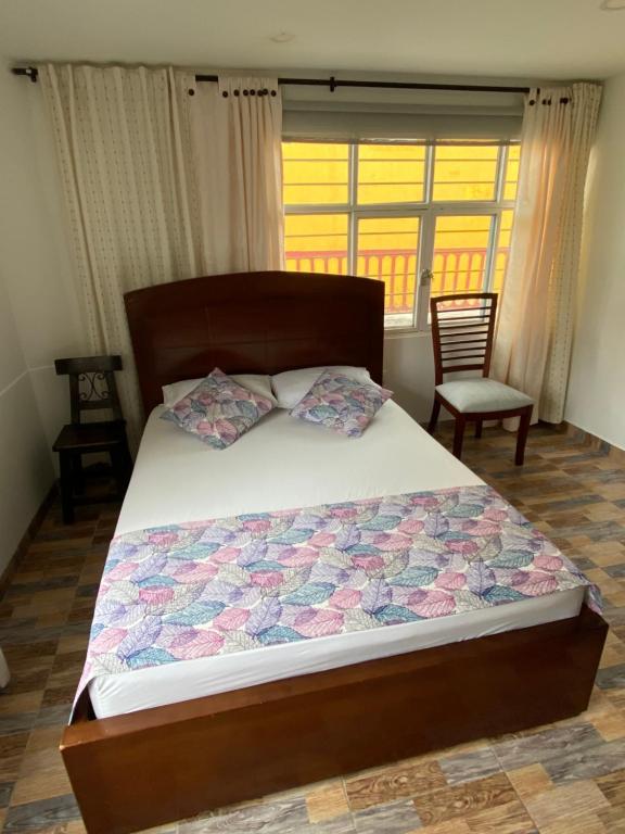 Cama o camas de una habitación en Hotel Encanto Filandia