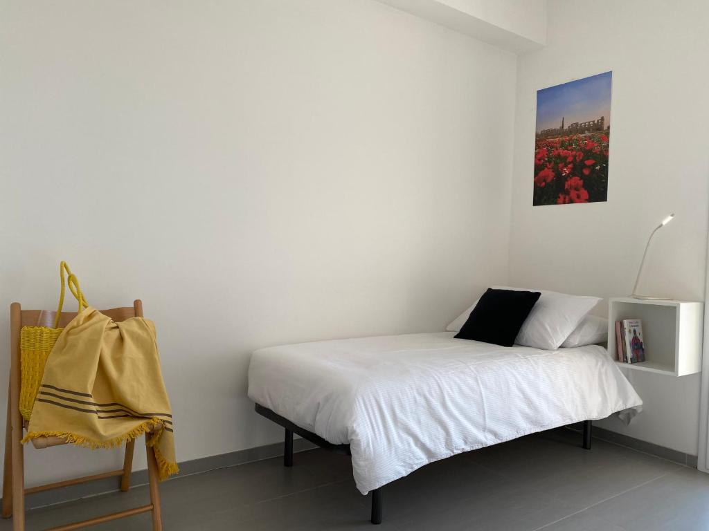 Postel nebo postele na pokoji v ubytování Casa Rogos