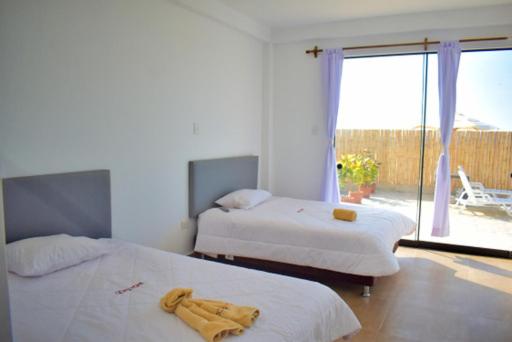 Postel nebo postele na pokoji v ubytování LIOMS HOME