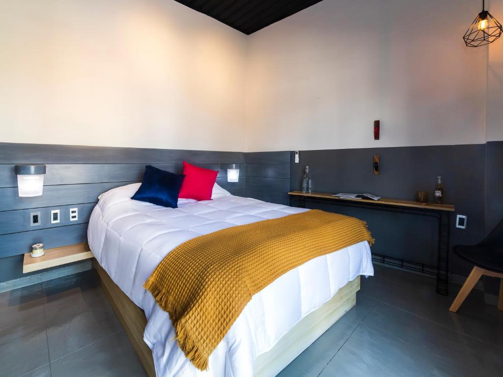 Ένα ή περισσότερα κρεβάτια σε δωμάτιο στο Hotel NEXT