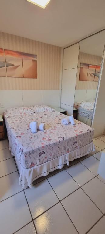Postel nebo postele na pokoji v ubytování Gran Lençóis Flat Residence