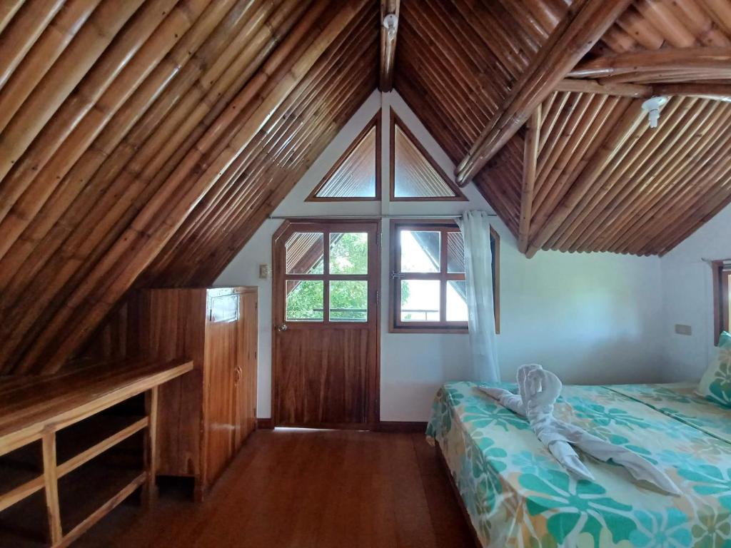 Postel nebo postele na pokoji v ubytování Paras Inn Boracay