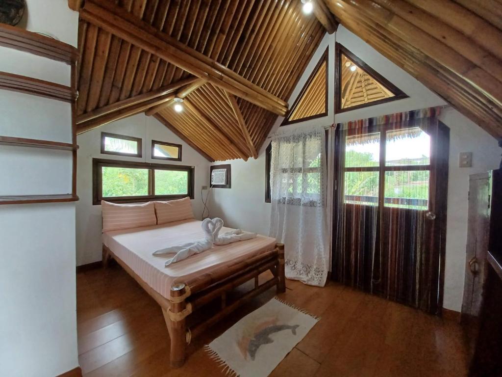 Postel nebo postele na pokoji v ubytování Paras Inn Boracay