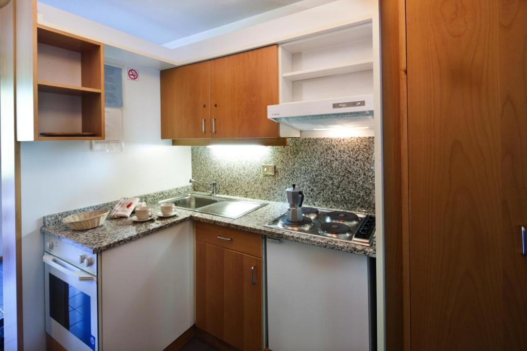 Kuchyň nebo kuchyňský kout v ubytování Residence Campolongo
