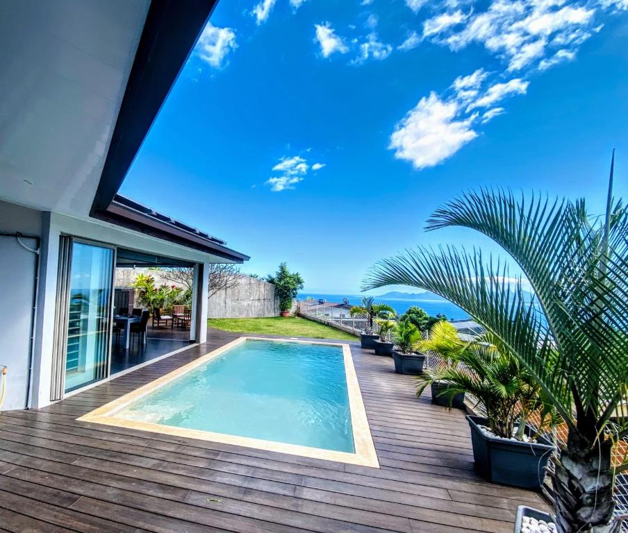 Villa Tiki PUNAAUIA vue mer - photo 6 - Tahiti, Polynésie