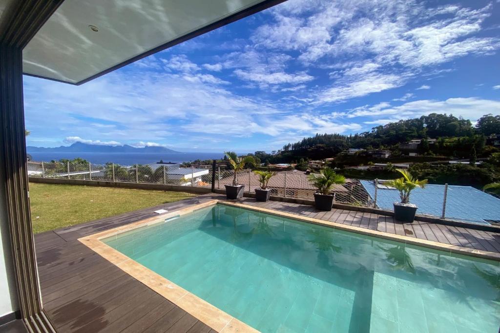 Villa Tiki PUNAAUIA vue mer - photo 7 - Tahiti, Polynésie