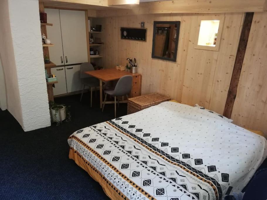 Postel nebo postele na pokoji v ubytování Le Carnotzet
