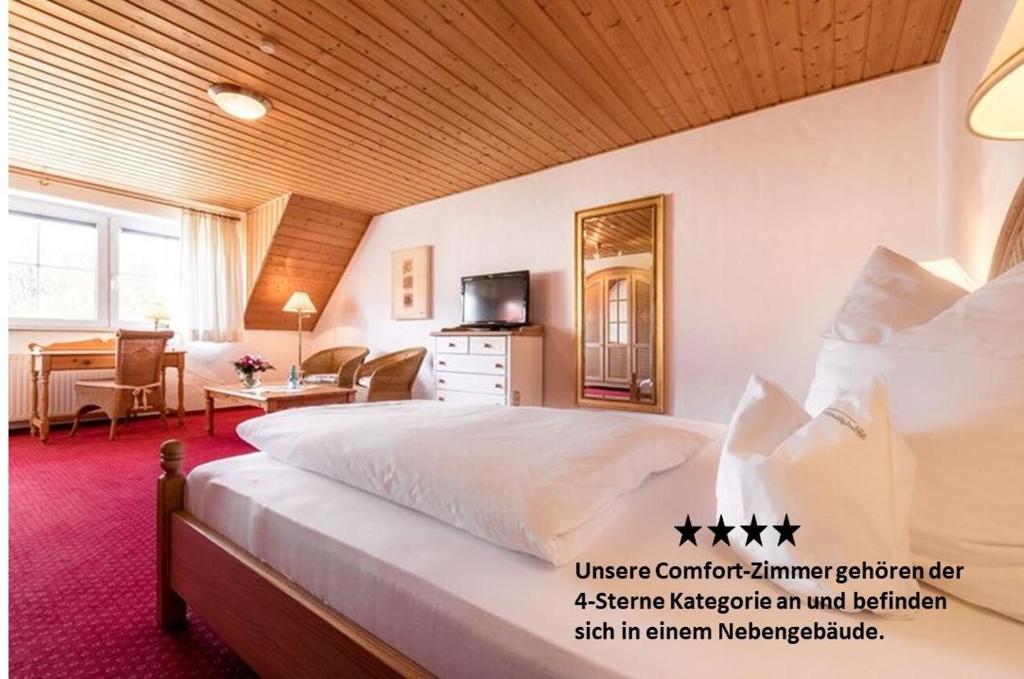 Postel nebo postele na pokoji v ubytování Hotel Antoniushütte