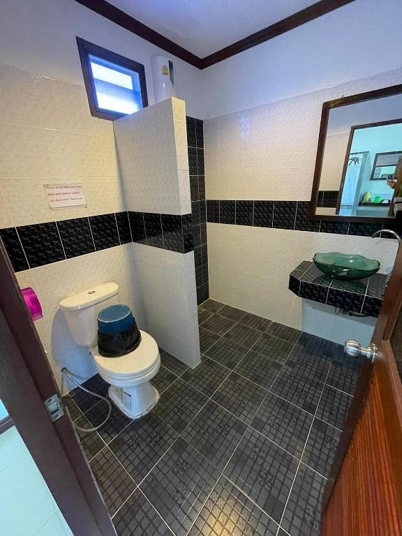 Koupelna v ubytování Cha-Cha Hotel