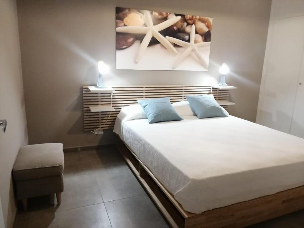 Posteľ alebo postele v izbe v ubytovaní Appartamento Corallo