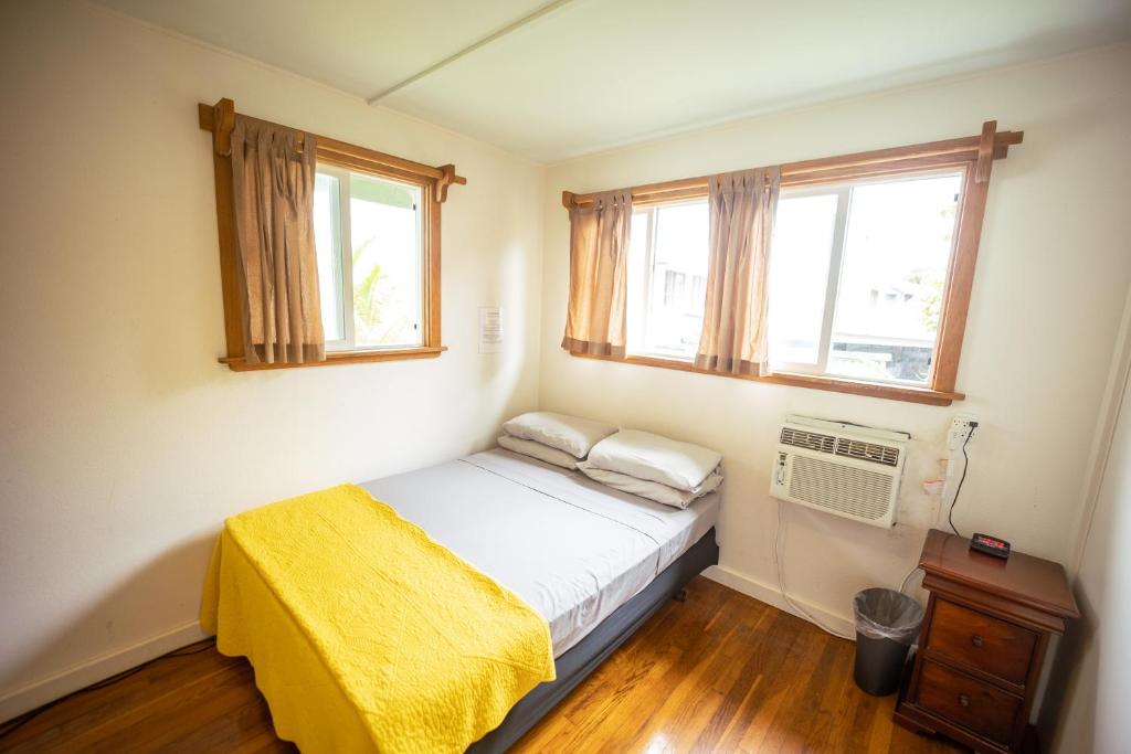 Postel nebo postele na pokoji v ubytování Hilo Vacation Rental