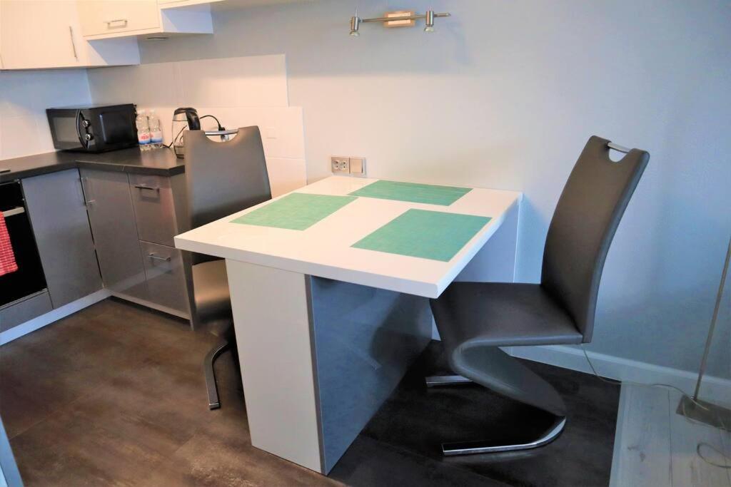Kuchyňa alebo kuchynka v ubytovaní Uroczy Apartament- Kołobrzeg