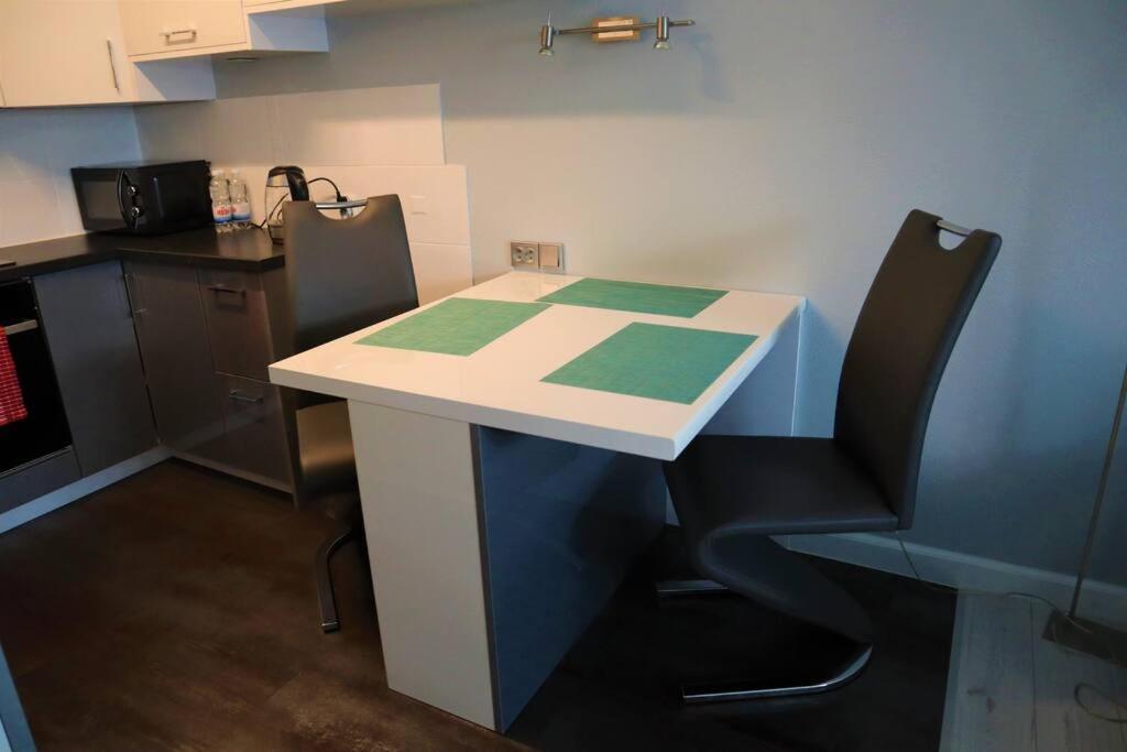Kuchyňa alebo kuchynka v ubytovaní Uroczy Apartament- Kołobrzeg