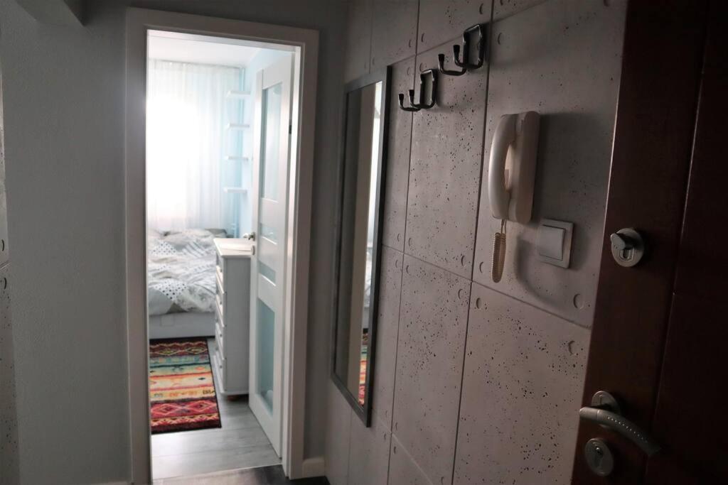 Posteľ alebo postele v izbe v ubytovaní Uroczy Apartament- Kołobrzeg