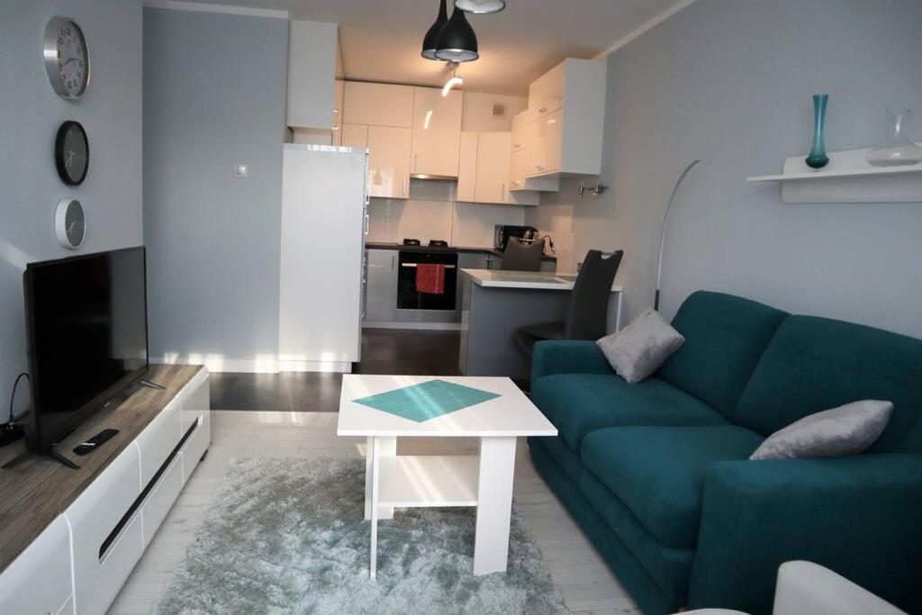 Kuchyňa alebo kuchynka v ubytovaní Uroczy Apartament- Kołobrzeg